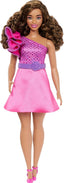 Mattel Barbie Fashionistas doll with stylish outfit and vibrant hair, standing against a neutral background.