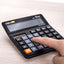 Playzokids Deli Calculator in plastic with 120 steps and 12 digits, featuring a digital display and colorful buttons.