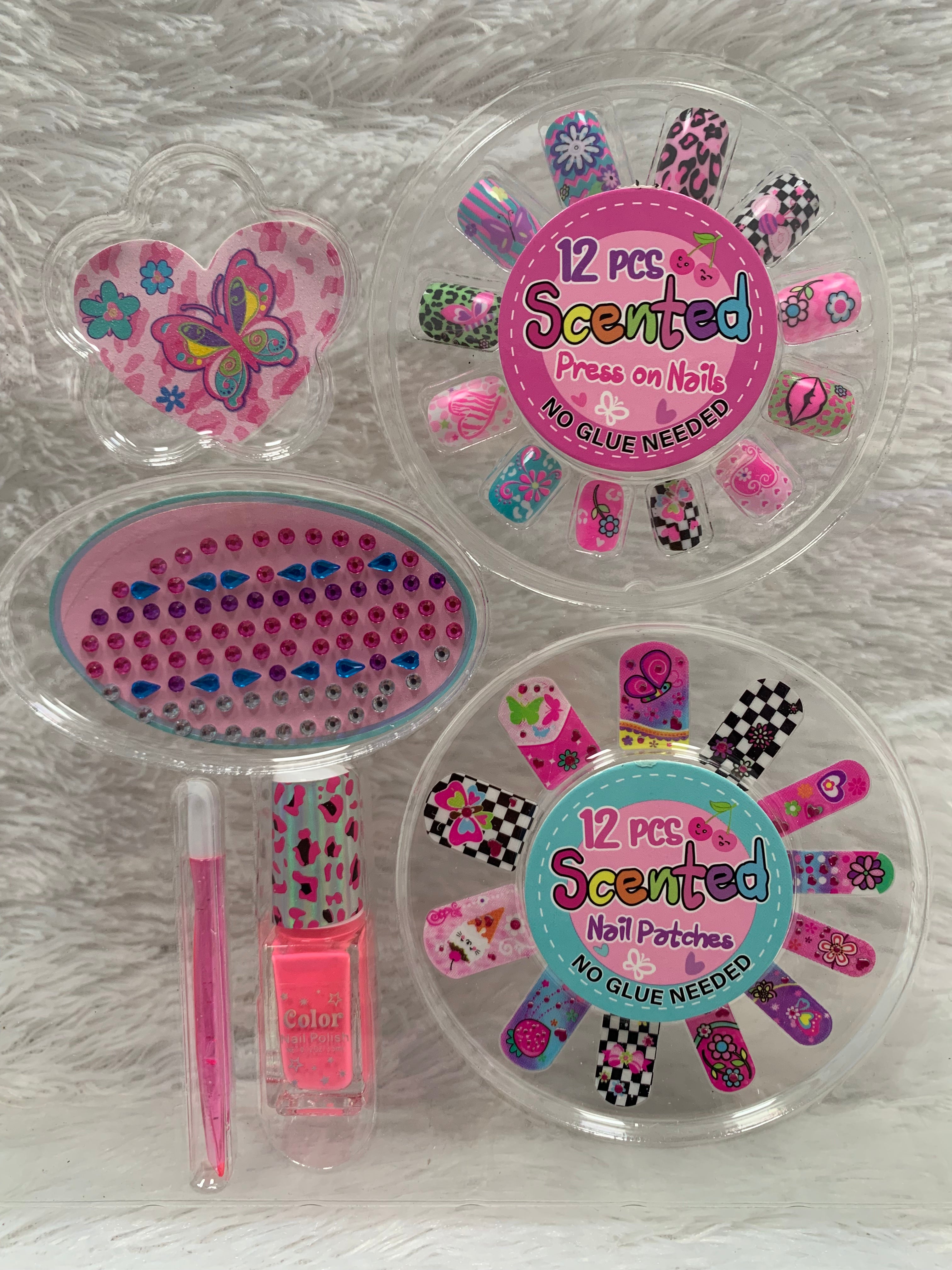 PECOWARE Pecoware Best Scented Nail Art Kit with colorful nail polishes, tools, and scented nail decorations for creative manicures.