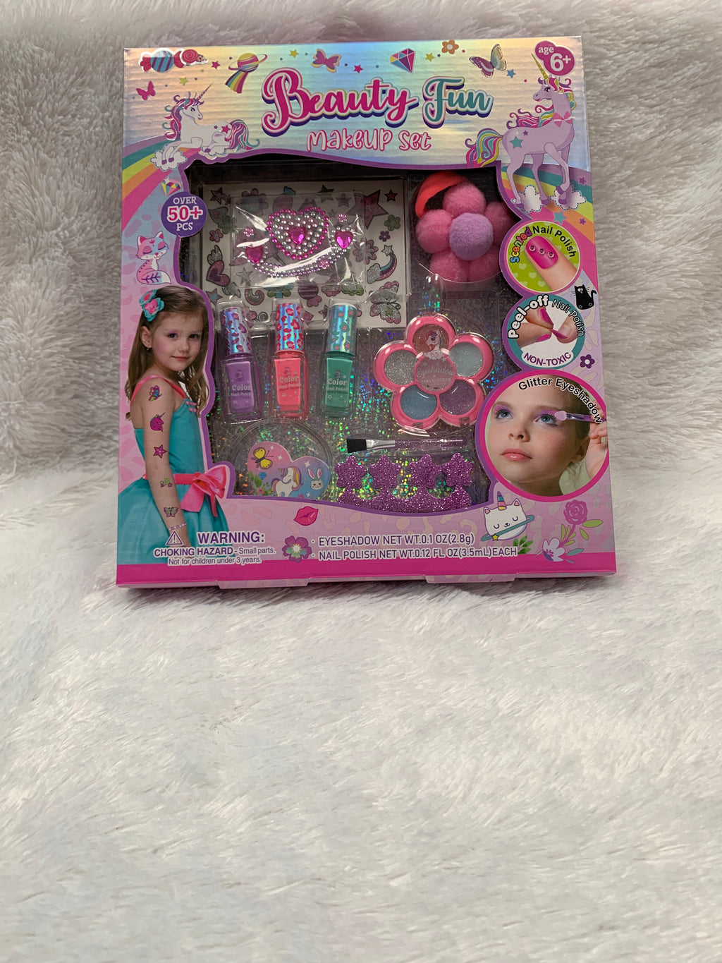 PECOWARE BEAUTY FUN makeup set with colorful eyeshadows, blush, and brushes arranged on a white background.