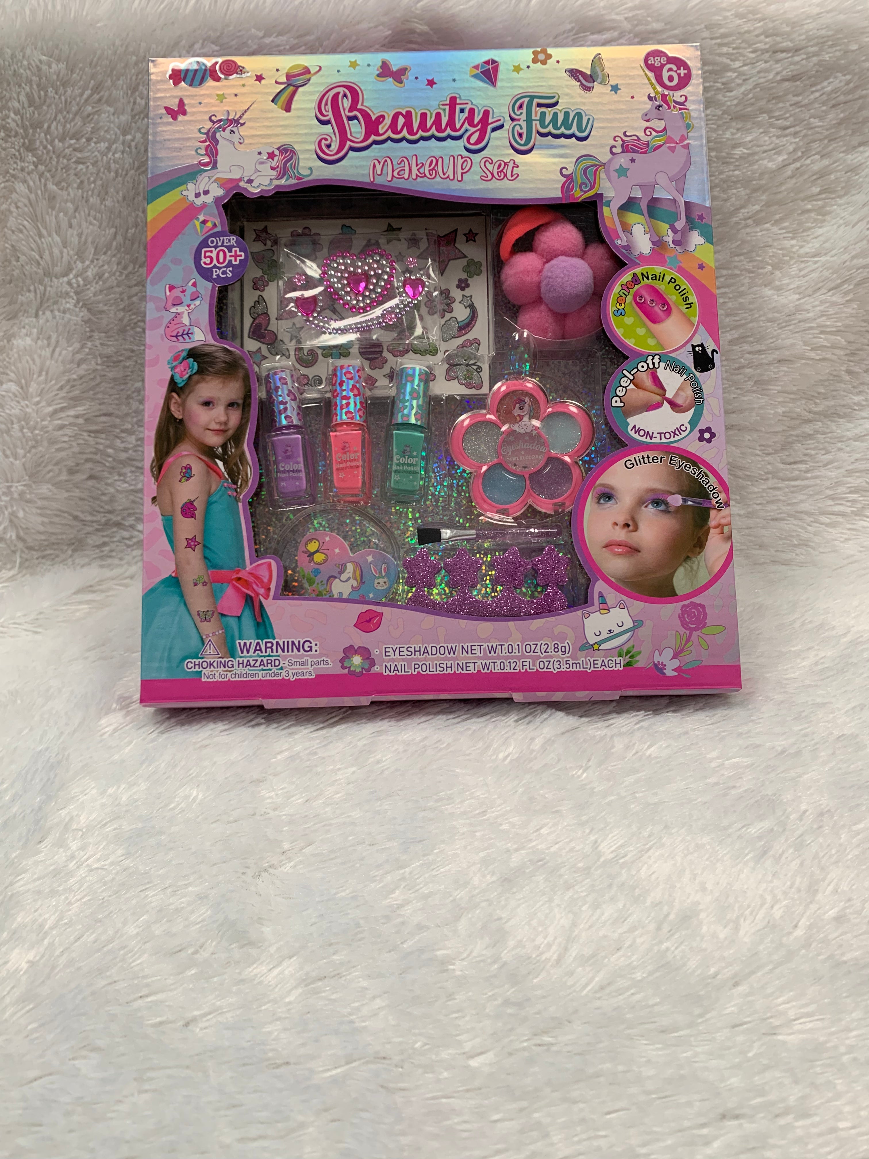 PECOWARE BEAUTY FUN makeup set with colorful eyeshadows, blush, and brushes arranged on a white background.