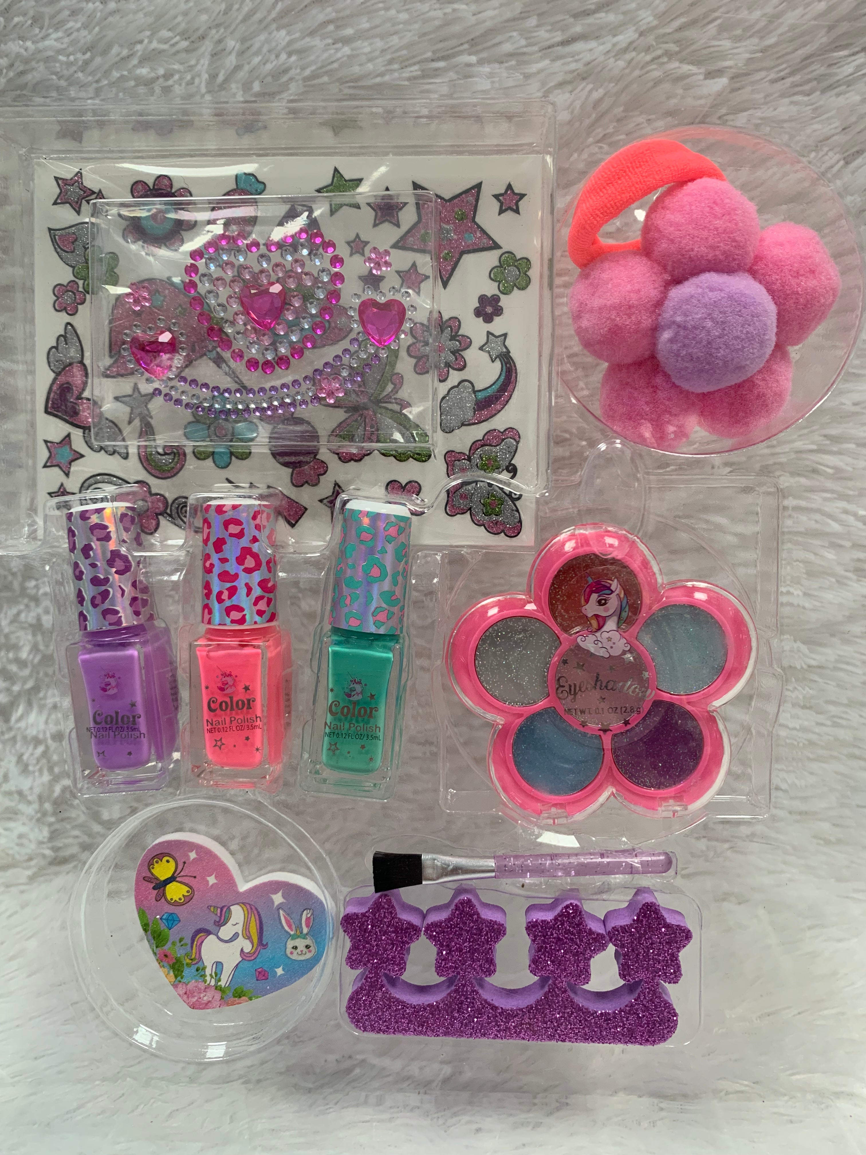 Beauty Fun Makeup Set by PECOWARE featuring colorful eyeshadows, lip glosses, brushes, and applicators for creative makeup looks.