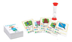 Pressman Charades for Kids game with colorful cards and game pieces arranged on a table for family fun.