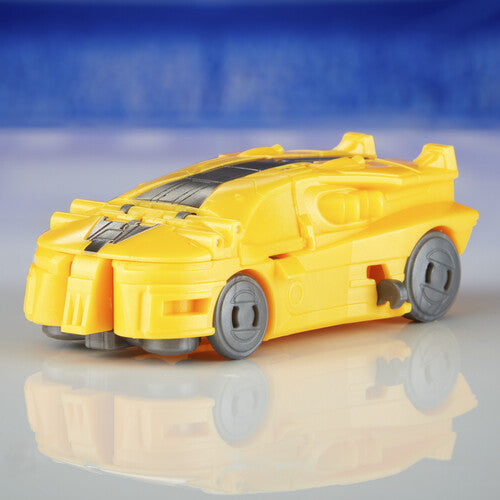 Hasbro Transformers One Cog Changer Bumblebee action figure with yellow car and robot mode, detailed robot figure with automotive design features.