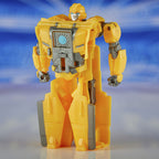 Transformers Bumblebee Cog Changer toy by Hasbro, featuring Bumblebee in robot and vehicle modes in a colorful plastic design.