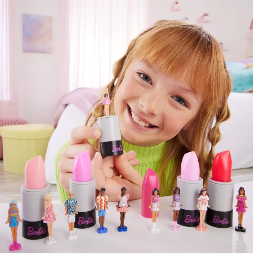 Mini Barbie dolls by Mattel, 1.5-inch collectible dolls inside a lipstick tube, featuring colorful outfits and detailed doll faces.