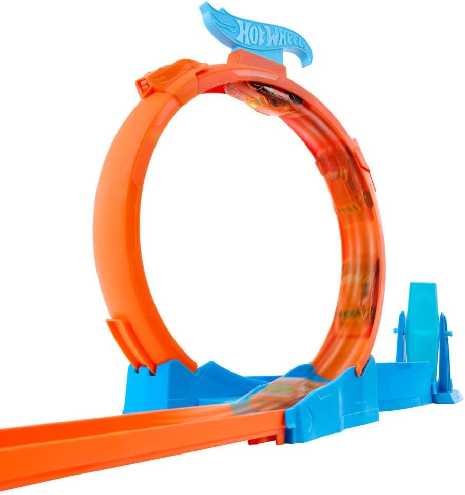 Hot Wheels toy car track set with triple loops and 1:64 scale vehicle for kids and racing fun.