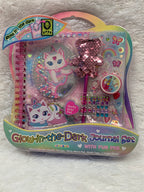 Glow in the dark journal set by PECOWARE featuring a dark cover with glowing design elements and multiple pages inside.