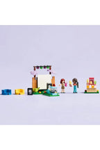 LEGO 42642 Friendship Movie Night set featuring LEGO characters enjoying a cozy movie scene with a LEGO TV and sofa.