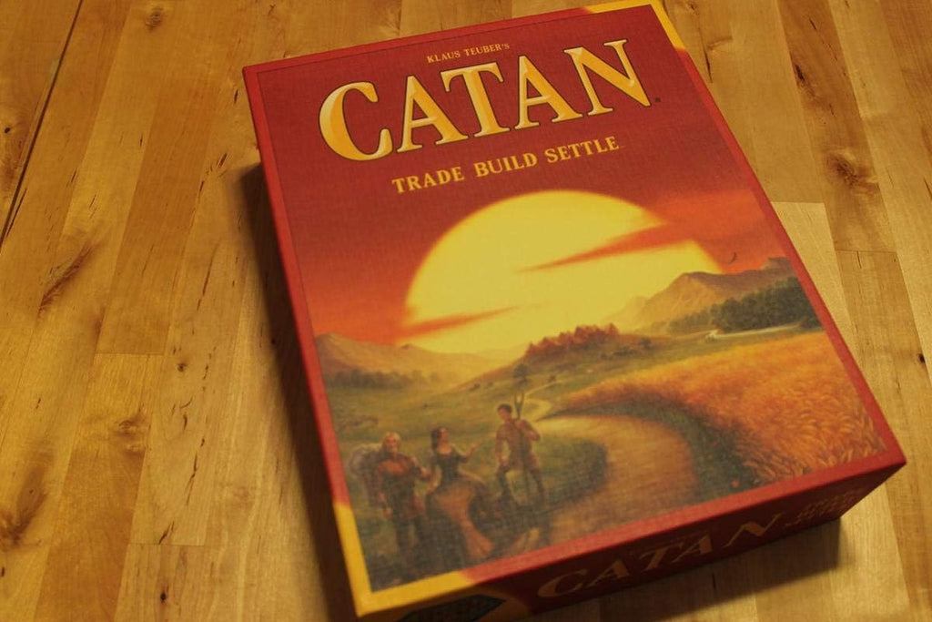 Playzokids Catan 6th Edition trade and build set, featuring colorful game board and pieces for the popular Settlers of Catan board game.
