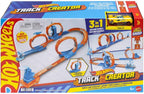Hot Wheels toy car track set with triple loops and a 1:64 scale Hot Wheels vehicle on a white background.