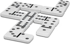 Playzokids Ambassador MA Classic Games Dominoes set with black and white domino tiles on a wooden surface.