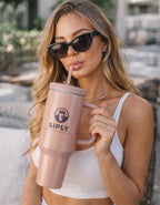 Siply 40oz stainless steel insulated tumbler with handle, lid, and straw cover, ideal for hot and cold drinks like water, coffee, or iced tea.