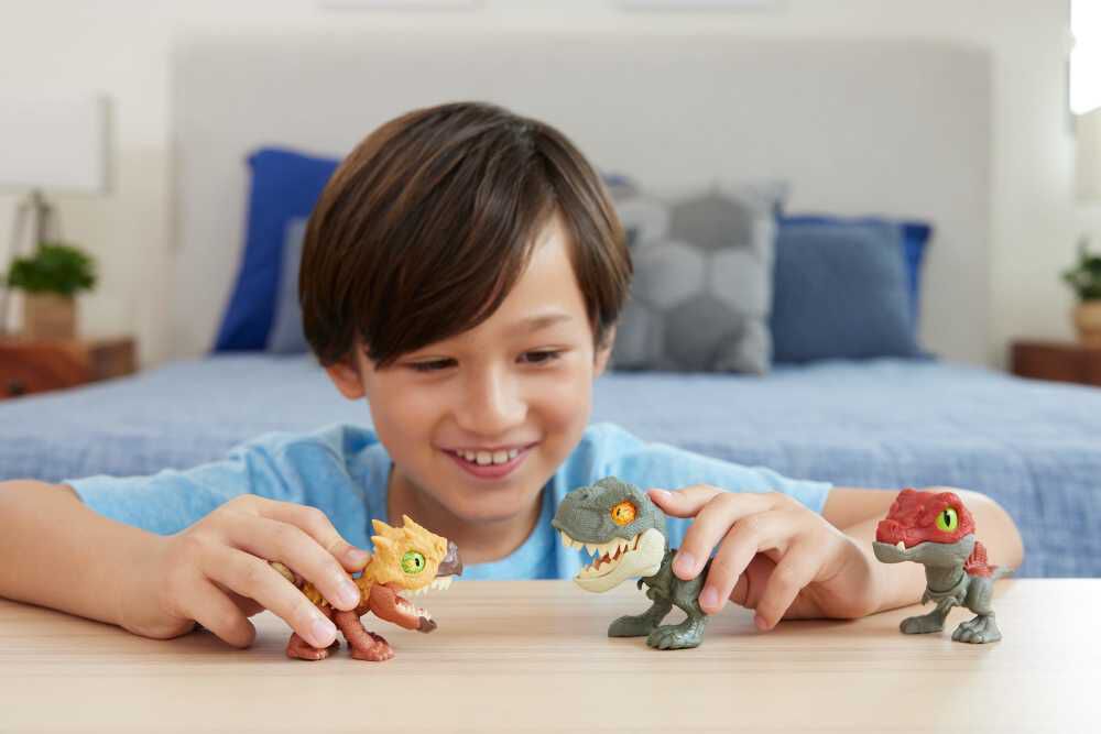 Jurassic World Mighty Biters Ankylosaurus toy with detailed scales and armored body, designed for children and dinosaur enthusiasts.