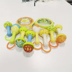 Baby-grade Dutora vibrating hand bell toy with colorful handle and small bell for sensory play and entertainment.