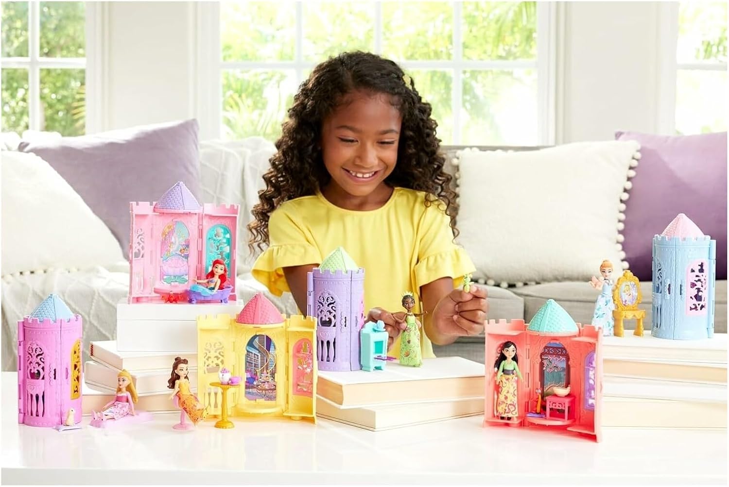 Mattel Disney Princess or Villains Tower Surprise small doll toy featuring a colorful character from the Disney universe.