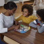 Hasbro Trouble board game with colorful plastic pegs and game board for family fun and strategic play
