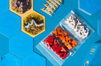 Playzokids Catan Seafarers Expansion set with colorful game pieces and map for the Catan board game.