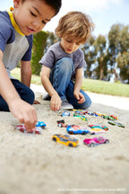 Set of 8 Hot Wheels 1:64 scale basic die-cast cars, featuring colorful miniature vehicles on a white background.