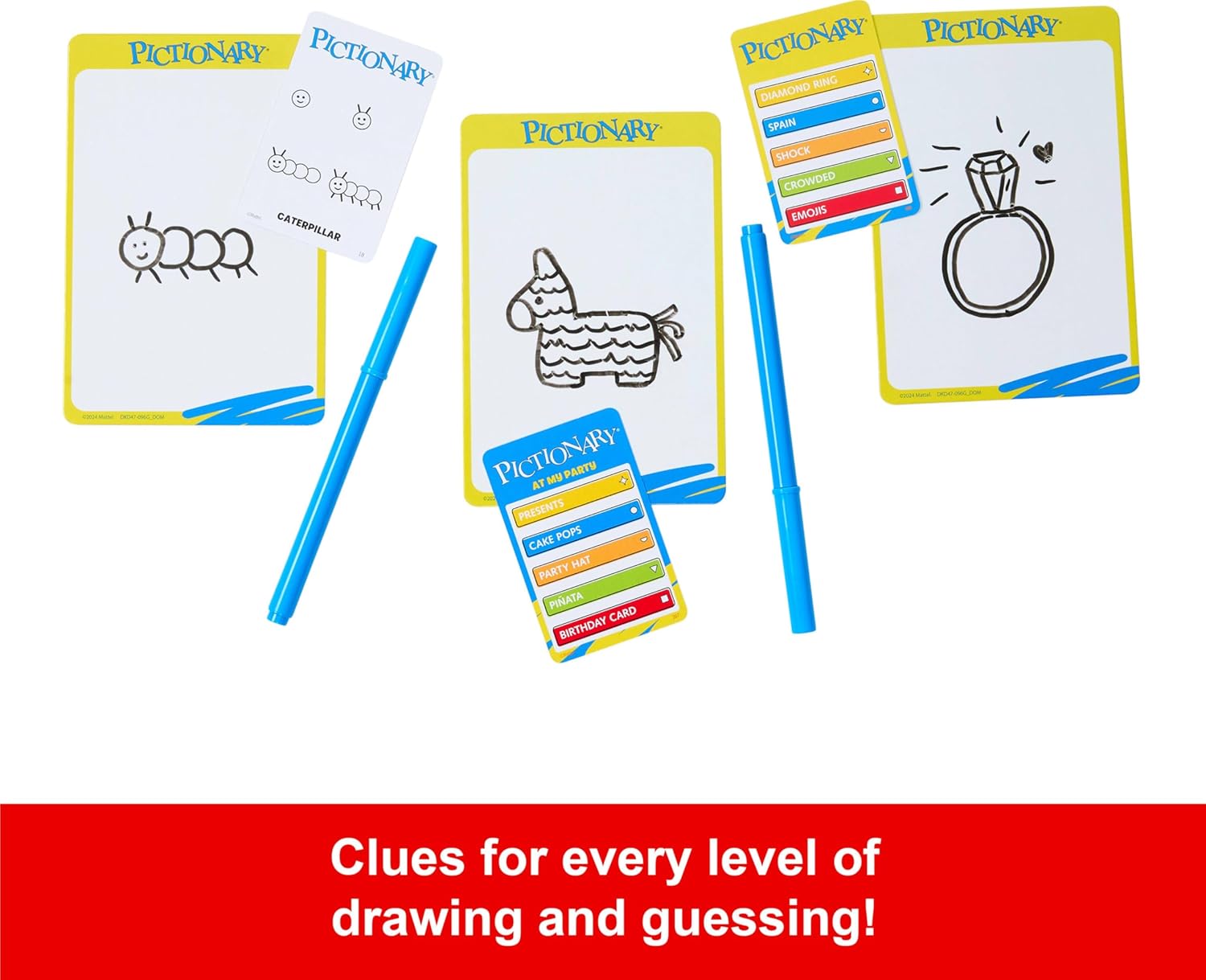 Mattel Pictionary board game with colorful game pieces and drawing cards laid out on a wooden table.