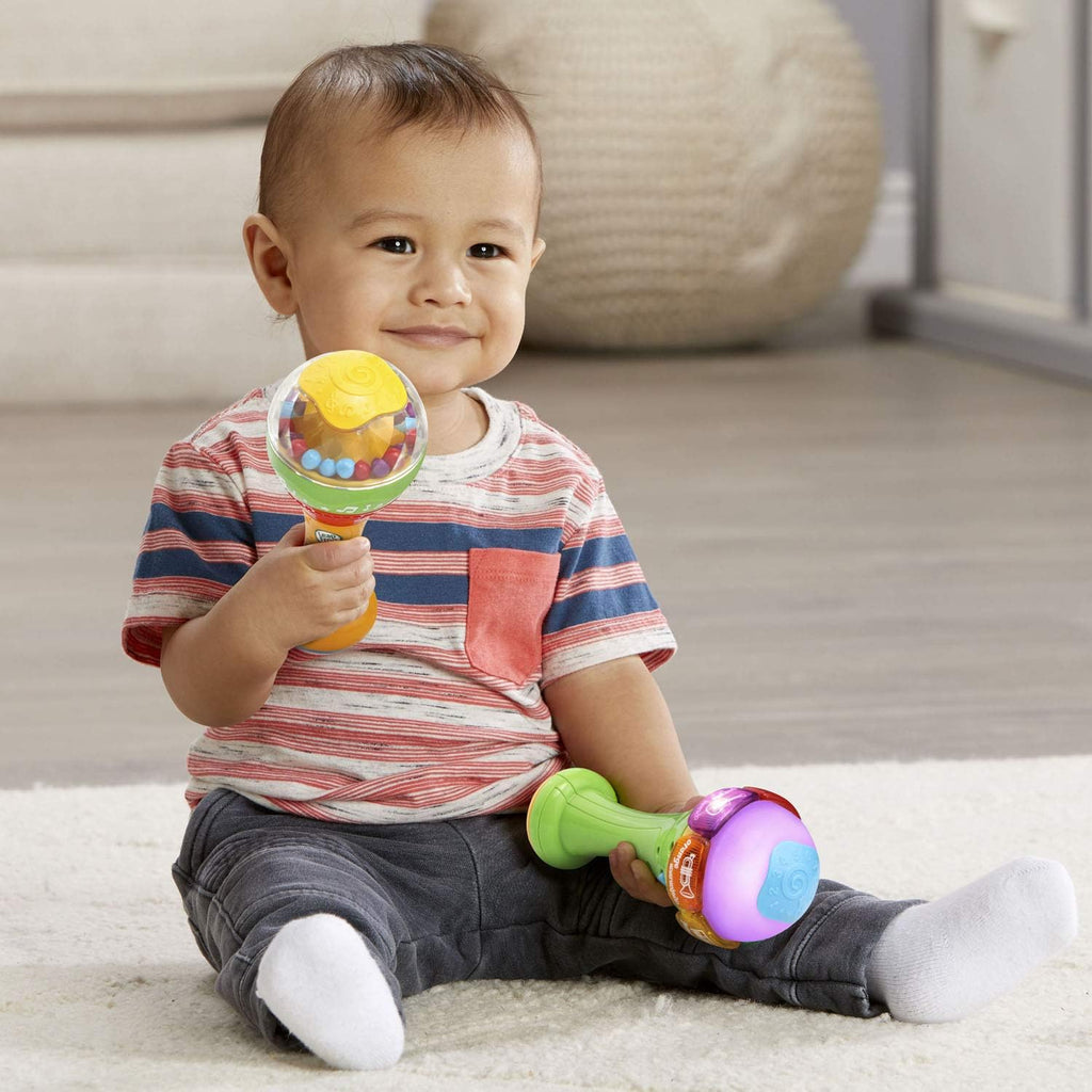 Vtech Leapfrog Learn & Groove Shakin' Colors toy with colorful buttons and musical features for early childhood learning and play.