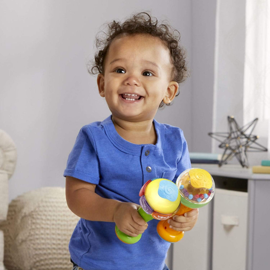 Vtech Leapfrog Learn & Groove Shakin' Colors toy with colorful buttons and musical features for interactive learning and fun.