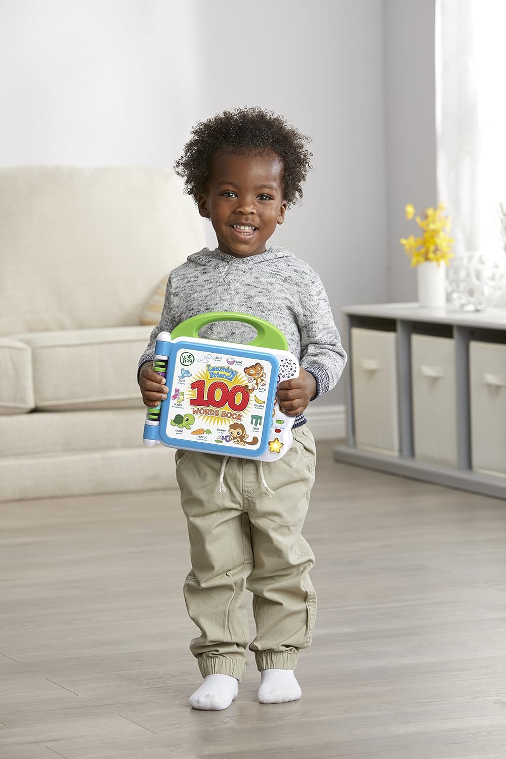 Vtech Leapfrog 100 Animals Book open showing colorful pages with animal illustrations and interactive features