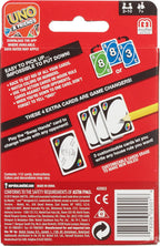 Mattel UNO classic card game featuring colorful numbered and action cards on a playing table.