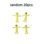 Stretchable yellow figure toy by Creative Lala, showing flexible, vibrant yellow plastic figure with articulated limbs.