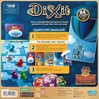 Dixit family board game by Playzokids, featuring illustrated cards and game components on a wooden table.