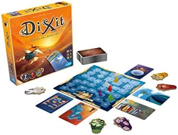 Dixit family board game by Playzokids, featuring illustrated cards and game components on a wooden table.