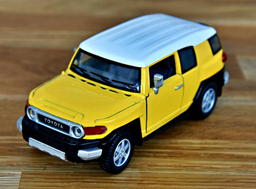 DIY Cast toy model car Toyota Xtreme 1:34 scale in assorted colors, detailed plastic replica with realistic design features.