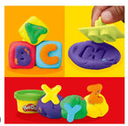 Hasbro Play-Doh Fundamentals ABC Tool Set with six colorful, non-toxic Play-Doh cans and ABC tools for creative learning.