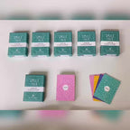 A box of SMILE TALK Parent-Game Cards with colorful cards and playful designs for engaging family activities.