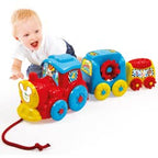 Tanny Kids funny rattle toy featuring a colorful train design for babies and toddlers around 10 months old.