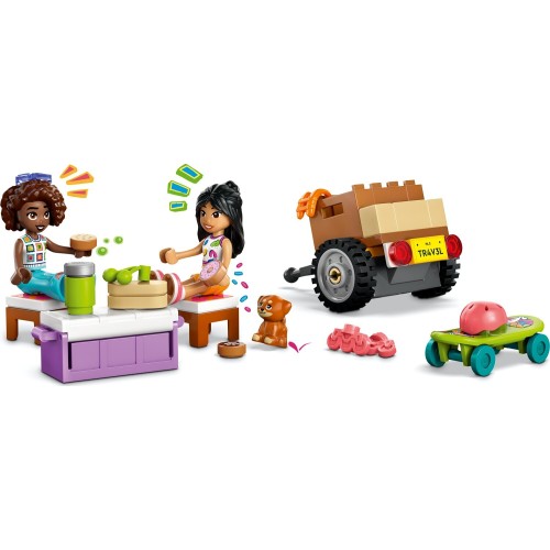 LEGO Friends hip road-trip travel car set 42659 with colorful car and mini-figures on a scenic road trip scene