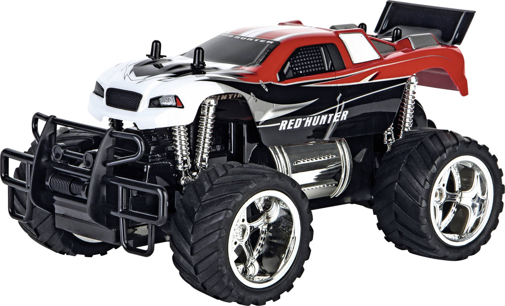 Red Carrera RC Hunter X 1:18 scale remote control toy car on a smooth surface.