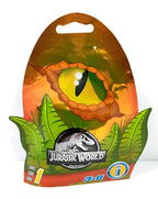 Jurassic World Series 1 blind box bag with surprise dinosaur toy featuring a colorful dinosaur figure on a white background.
