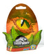 Jurassic World Series 1 blind box bag with surprise dinosaur toy featuring a colorful dinosaur figure on a white background.