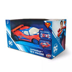 Bladez Toys RC Superman Racer remote control car on a track, featuring Superman logo and vibrant blue and red design.