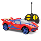 Bladez Toys RC Superman Racer remote control car on a track, featuring a Superman theme with blue, red, and yellow details.
